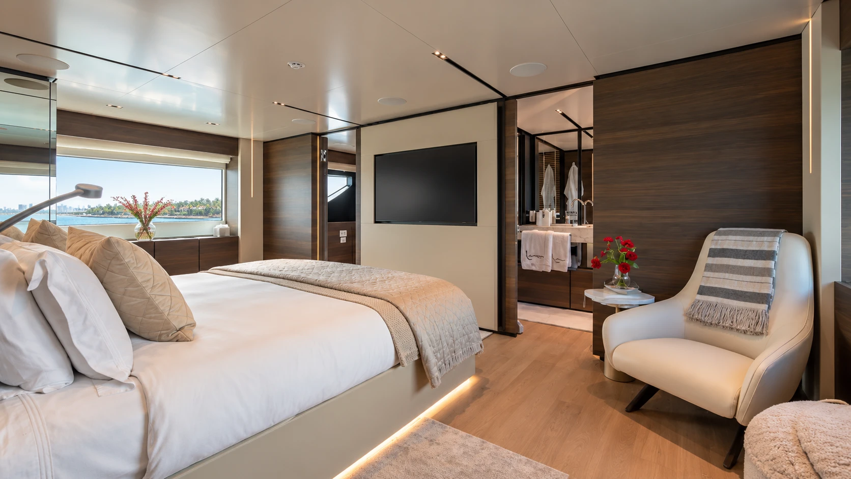 The owner's suite with its seating area beside the window